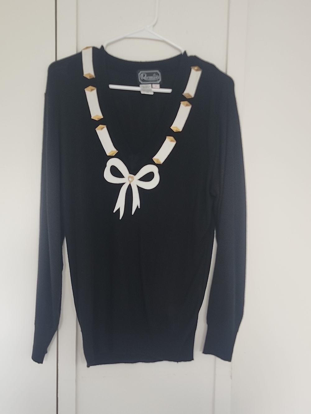 Renuar Black Long Sleeve Top with White Ribbon Bow and Gold Accents
